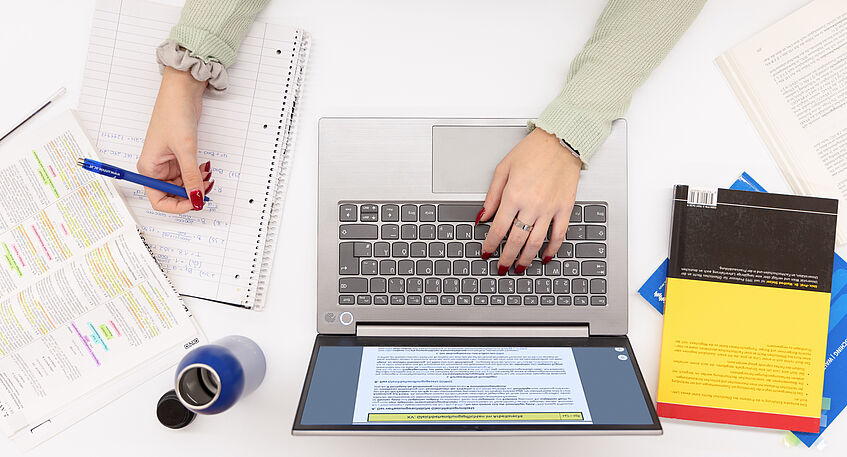 Picture of a working space with laptop.