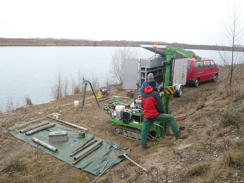 Set up equipment next to a lake.