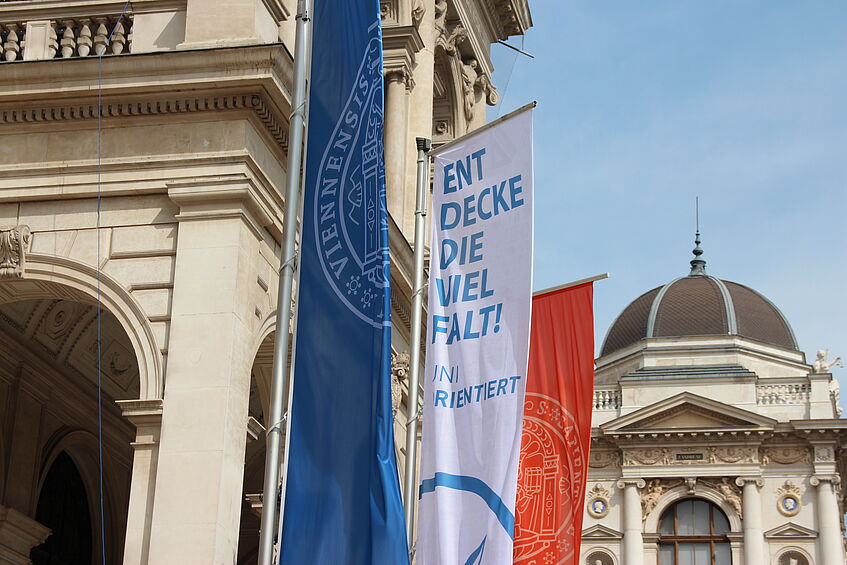 Picture of the flags in front of the main building.