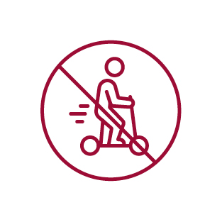 Icon: Sports equipment may not be used inside the buildings. (crossed out person riding on a scooter)